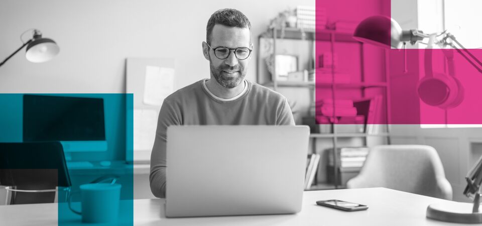 SINGLE-IMAGE_squares-sitting-at-his-desk-and-using-laptop_may25