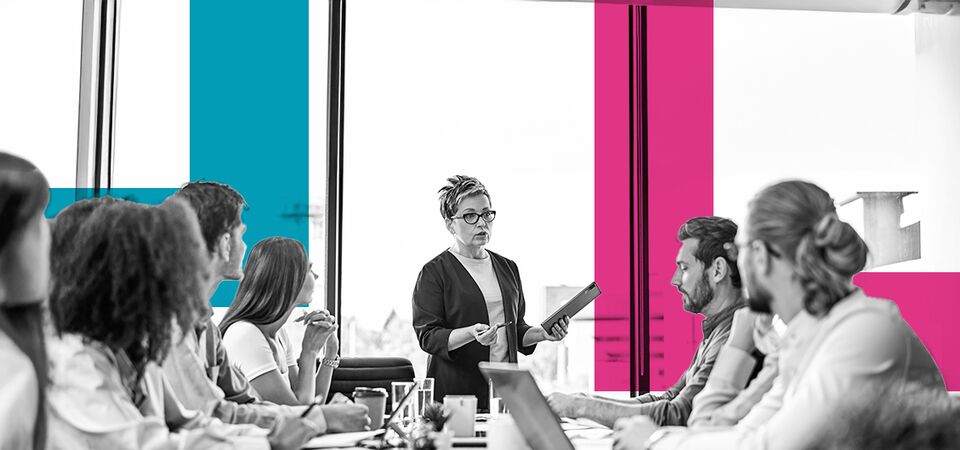 SINGLE-IMAGE_squares-business-meeting-with-tablet_apr25