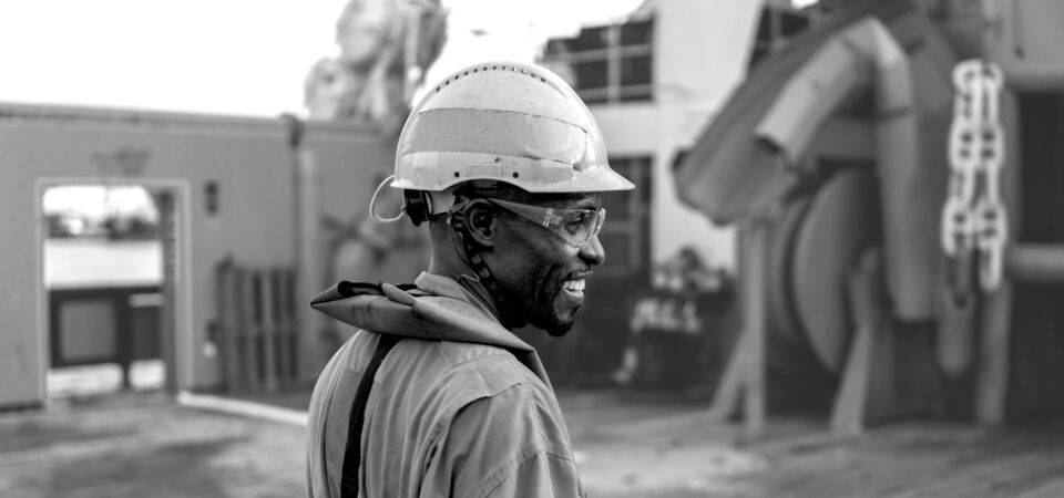 SINGLE-IMAGE_black-male-on-ship-deck_aug24