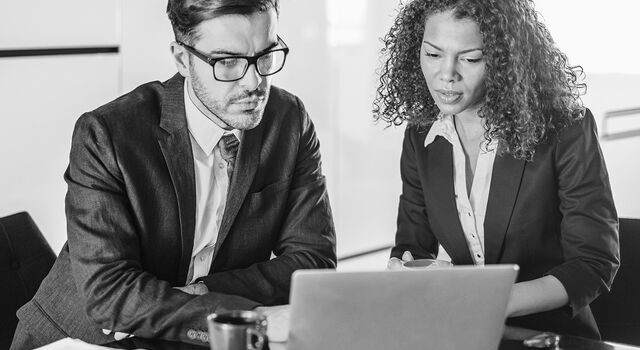 SINGLE-IMAGE_business-persons-with-laptop_feb25