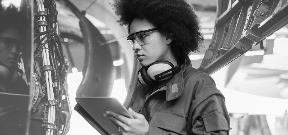SINGLE-IMAGE_female-worker-checking-aeroplane_apr25