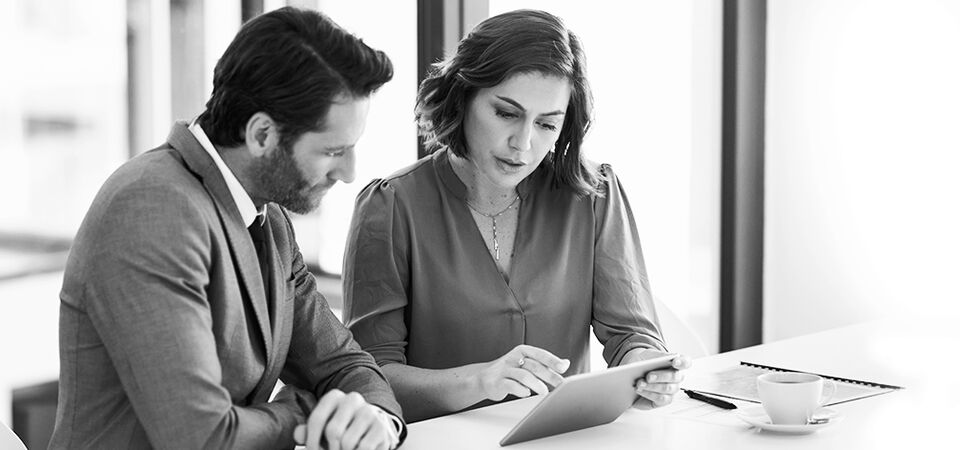 SINGLE-IMAGE_business-people-with-tablet_may25