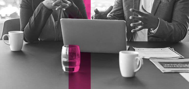 SINGLE-IMAGE_squares-man-&-woman-discussing-laptop_sept23