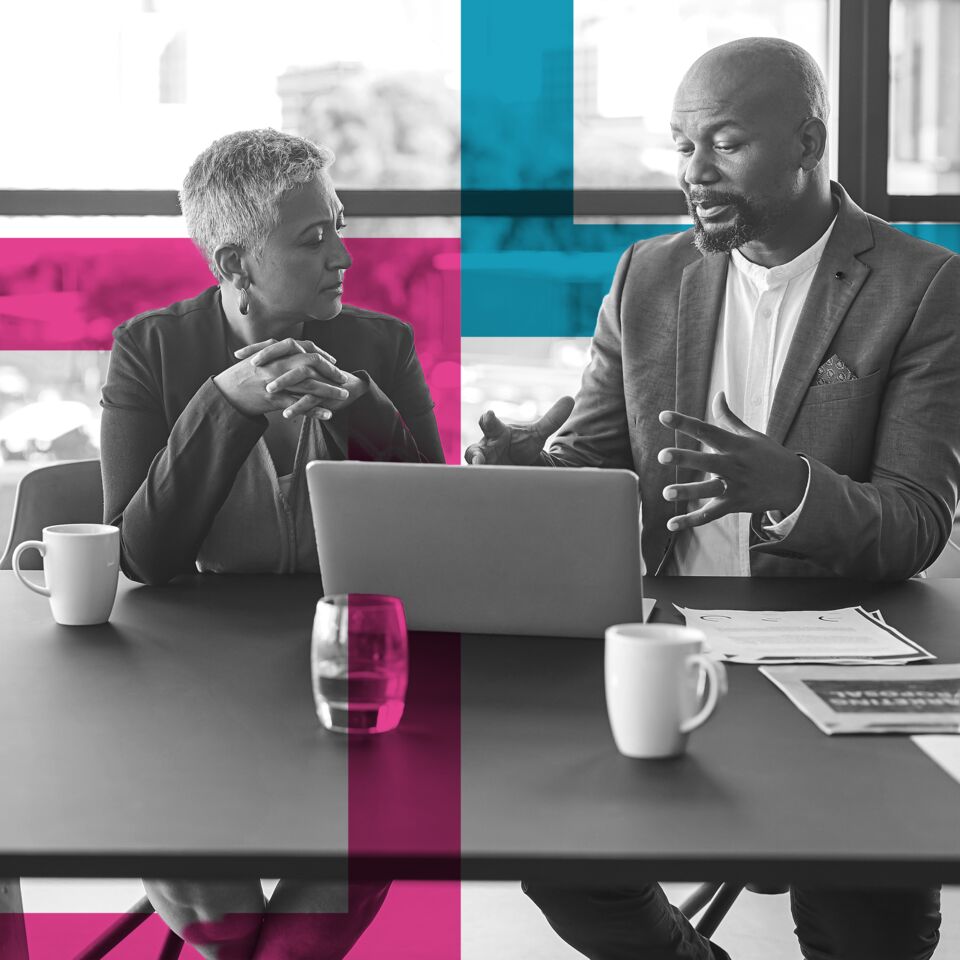 SINGLE-IMAGE_squares-man-&-woman-discussing-laptop_sept23